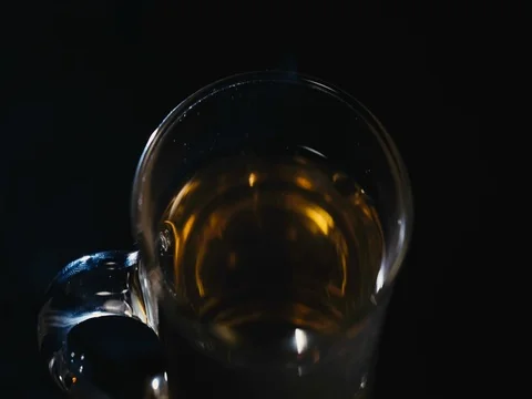 Milk poured into a Cup of tea Stock Footage 73938454