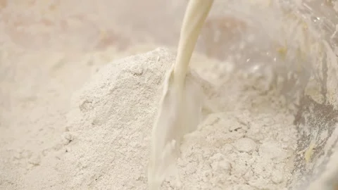 Milk Is Poured Into Flour Stock Footage 273501044