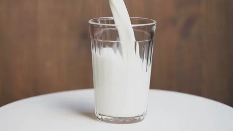 Milk poured. Stock Footage 147716496