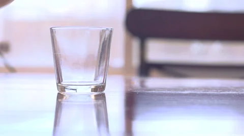 Milk poured into small glass Stock Footage 47045708