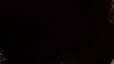 Milk poured into tea Stock Footage 71790203