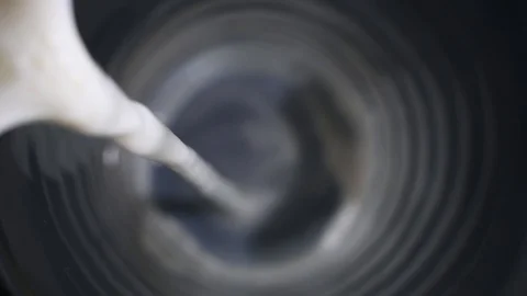 Milk is poured from top Stock Footage 119371339