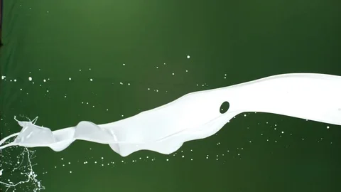 Milk pouring 07 in Slow motion Stock Footage 113543264