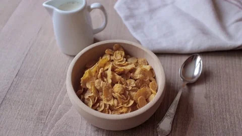 Milk Pouring To Corn Flakes Stock Footage 72495935