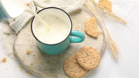 Milk pouring from jug Stock Footage 173371768
