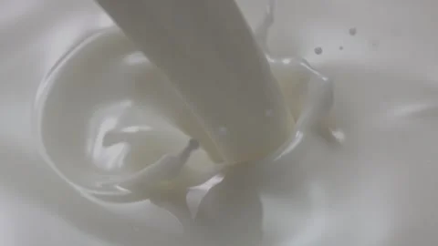 Milk pours in slow motion. Stock Footage 161525523