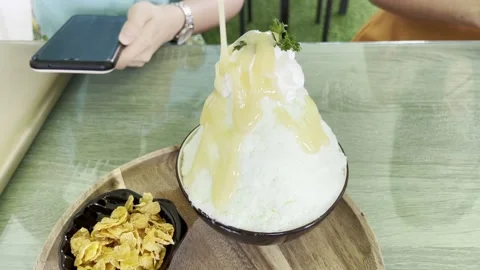 Milk on shaved ice. Stock Footage 150240848