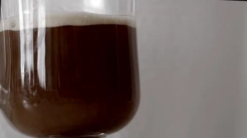 Milk splash into coffee Stock Footage 333792652