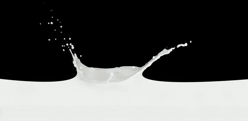 Milk splash Stock Photos