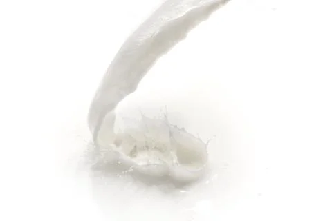 Milk splash Stock Photos