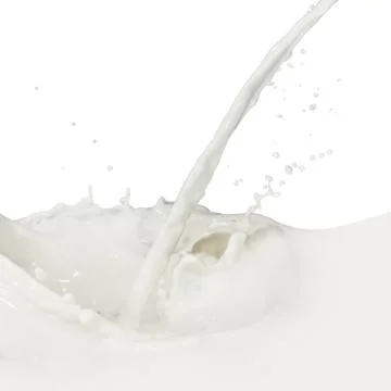 Milk splash Stock Photos
