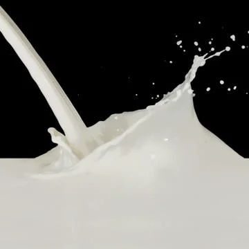 Milk splash Stock Photos