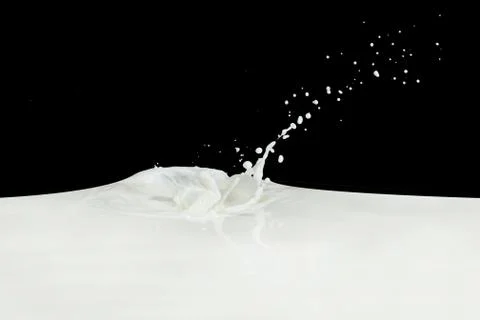 Milk splash Stock Photos