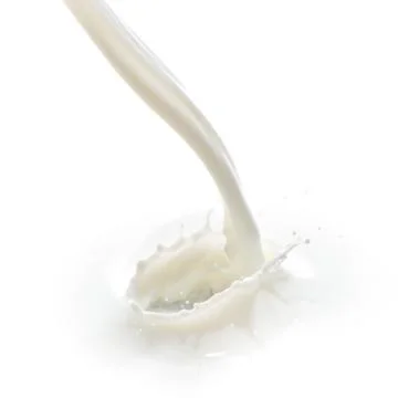 Milk splash Stock Photos