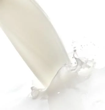 Milk splash Stock Photos
