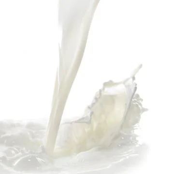 Milk splash Stock Photos