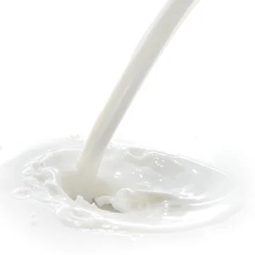 Milk splash Stock Photos