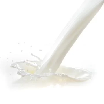 Milk splash Stock Photos