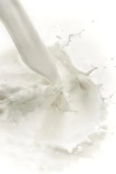 Milk splash Stock Photos