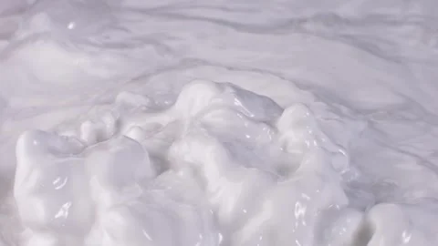 Milk Splashing Macro Shot，slow motion Video stock 248406612