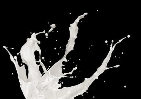 Milk splashing Stock Photos