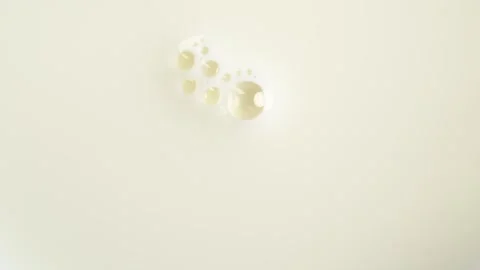 Milk surface with bubbles in slow motion. Stock Footage 277631668