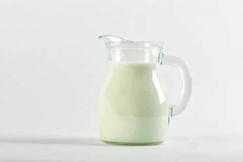 Milk in a vase 스톡 사진