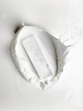 A milk wave. after falling into milk. Stock Photos