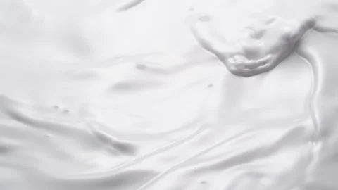 Milk waves with ripples Stock Footage 171888763