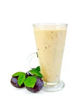 Milkshake with black plums Stock Photos