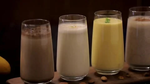Milkshake Combo Mango Banana Chocolate Pistachio Almond Drinks Stock Footage 333193117
