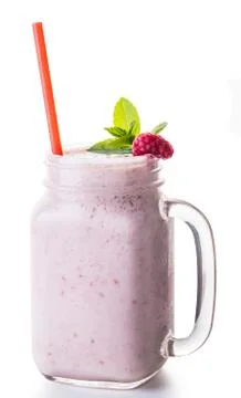 Milkshake fruit in jar with a straw Stock Photos