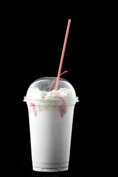 Milkshake in a glass. Stock Photos