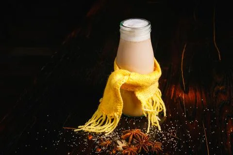 Milkshake with honey in a small bottle Фото