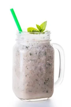 Milkshake in jar with a straw Foto stock