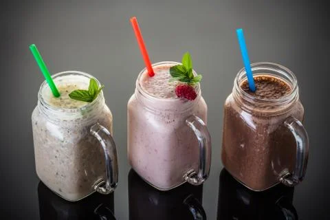 Milkshake in jar with a straw Foto stock