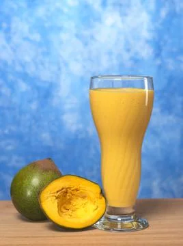 Milkshake out of the peruvian fruit called lucuma Stock Photos