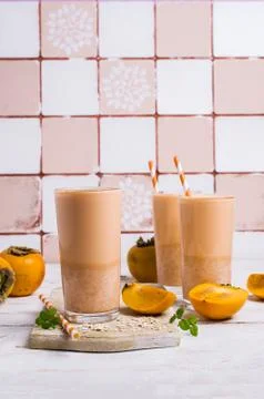 Milkshake with persimmon Stock-Fotos