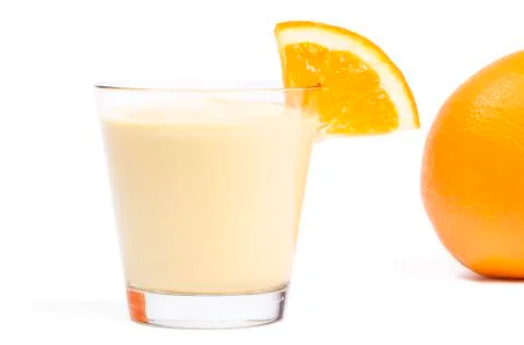Milkshake with a piece of orange Stock Photos