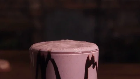 Milkshake, sprinkled with chocolate chips. Video stock 75240805