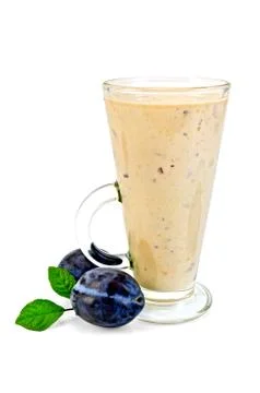Milkshake with two black plums Stock Photos