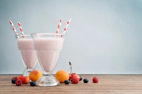 Milkshake on wodeen table Stock Photos