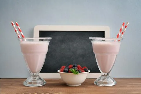 Milkshake on wodeen table Stock Photos