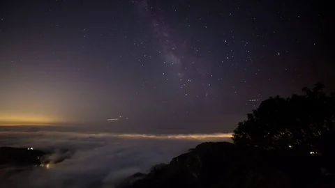 Milkway galaxy over the cloud fall in Malibu timelapse Stock Footage 70484181