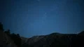 Milky Way above alpine mountain peaks time lapse stars 4k or 4k+ Resolution