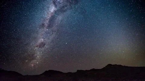 Milky Way and starry sky beyond mountain of the Namib desert, Namibia Stock Footage 68298400
