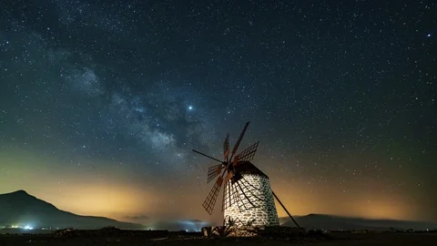 Milky way core over old historic windmill Stock Footage 110327002