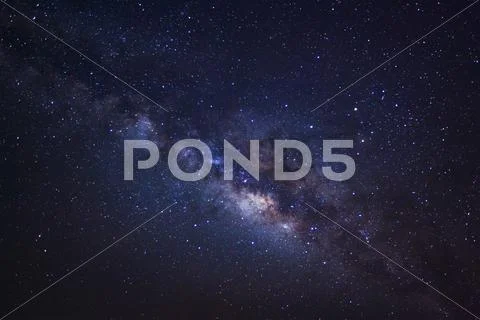 Milky way galaxy on a night sky, Long exposure photograph, with grain. Stock Photos