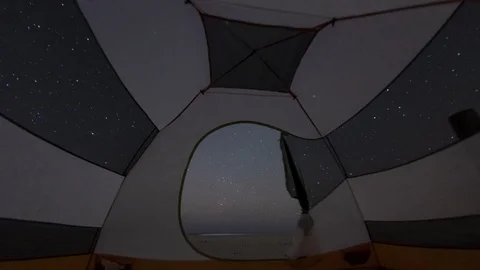 Milky Way Galaxy rising while camping in a tent Vidéo 126578075