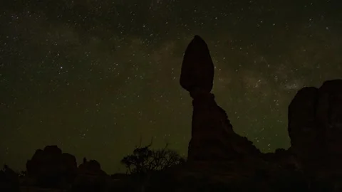 Milky Way over Balanced Rock in Arches National Park Utah night sky timelapse Stock Footage 334009758